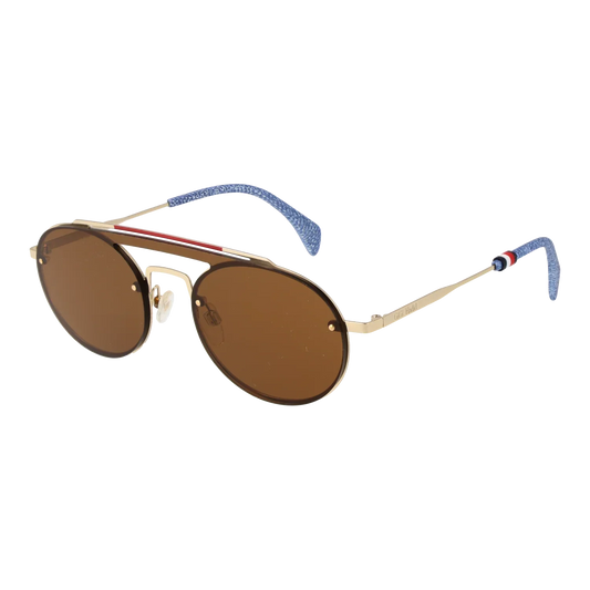 Tommy Hilfiger THF200 aviator sunglasses with gold frame and brown lenses on a Mediterranean rooftop